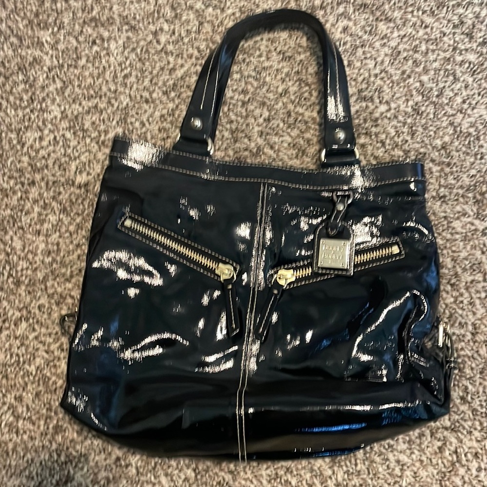 Dooney & Bourke, black pattern leather handbag